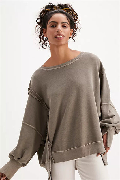 Oversized dames sweatshirt met ballonmouwen, open naden en zijspleten