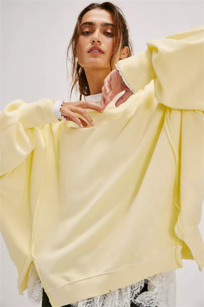 Oversized dames sweatshirt met ballonmouwen, open naden en zijspleten