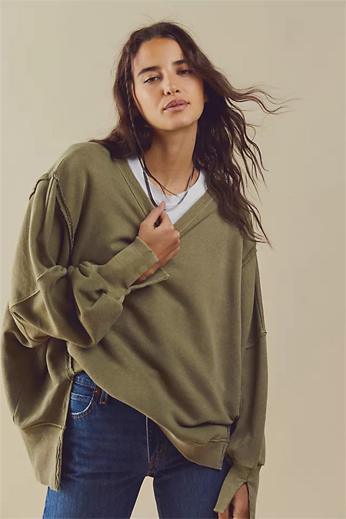 Oversized dames sweatshirt met ballonmouwen, open naden en zijspleten