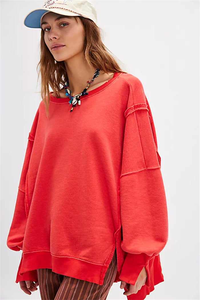 Oversized dames sweatshirt met ballonmouwen, open naden en zijspleten