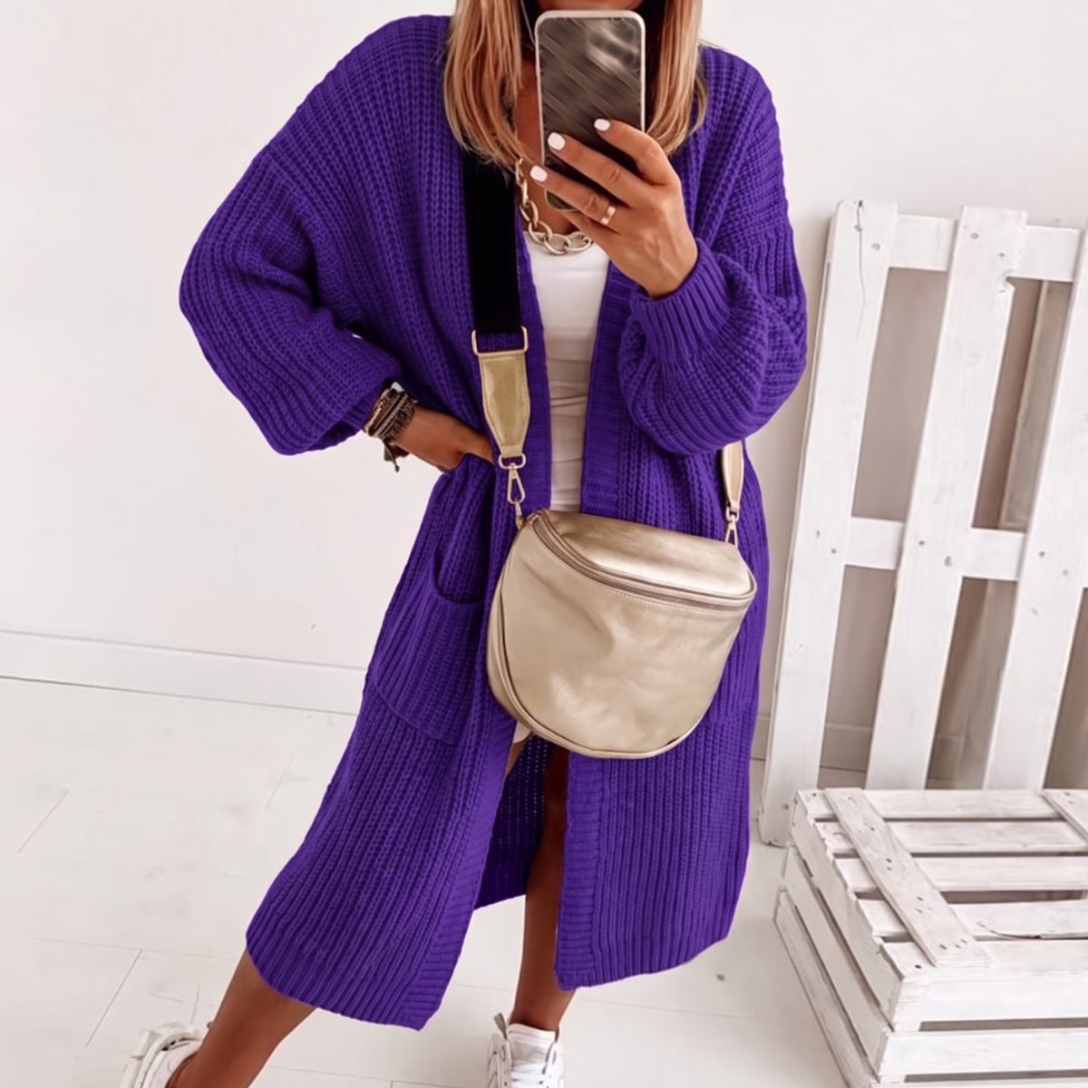 Oversized gebreid damesvest met open voorkant en ballonmouwen