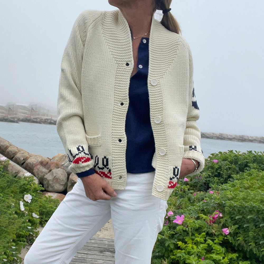 Oversized gebreid damesvest met walvismotief en nautische contrastbies