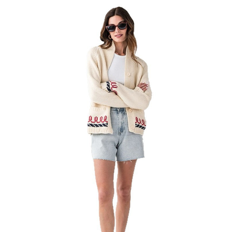 Oversized gebreid damesvest met walvismotief en nautische contrastbies