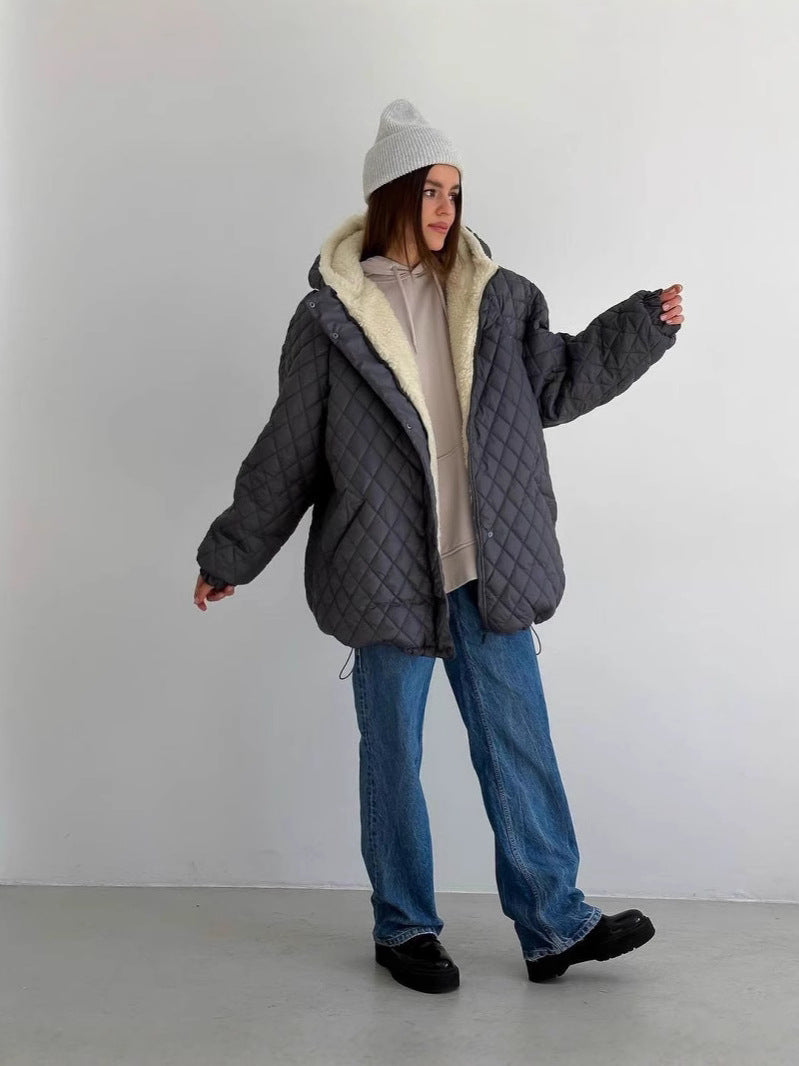Oversized gewatteerde damesjas met teddyvoering en capuchon