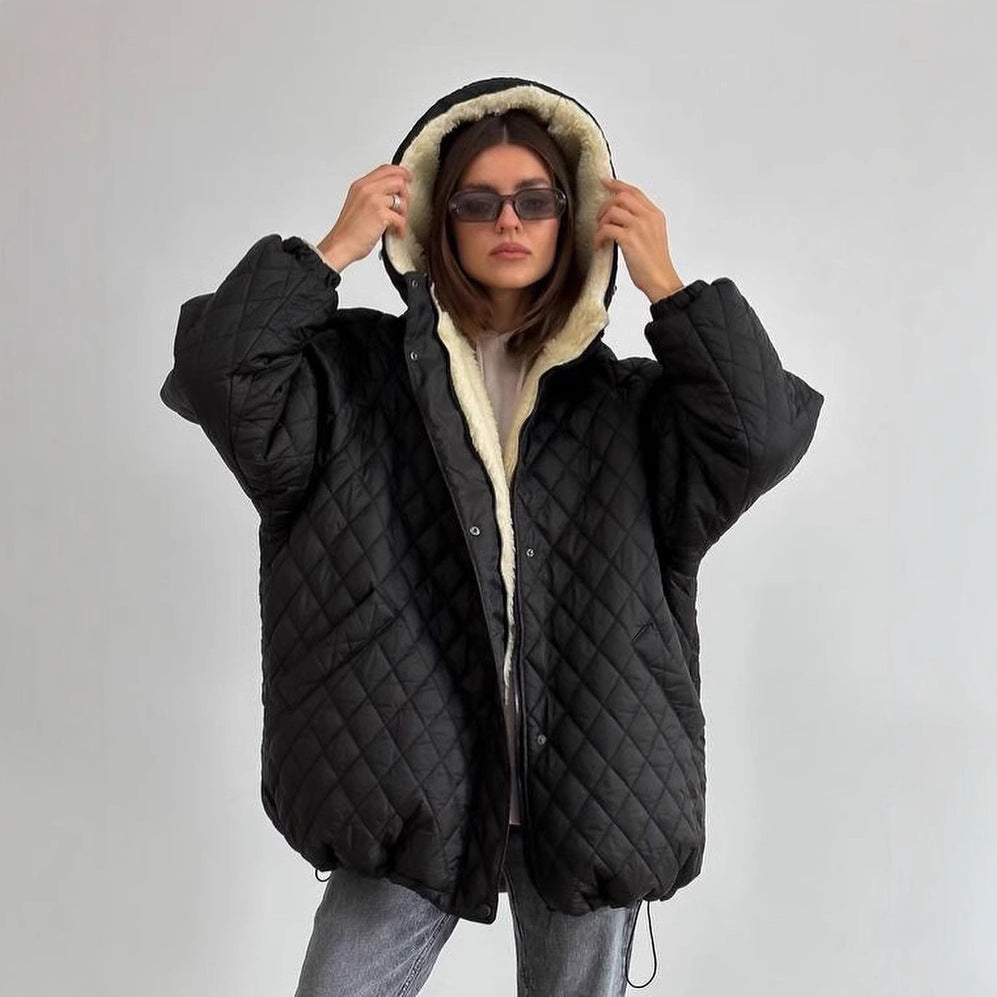 Oversized gewatteerde damesjas met teddyvoering en capuchon