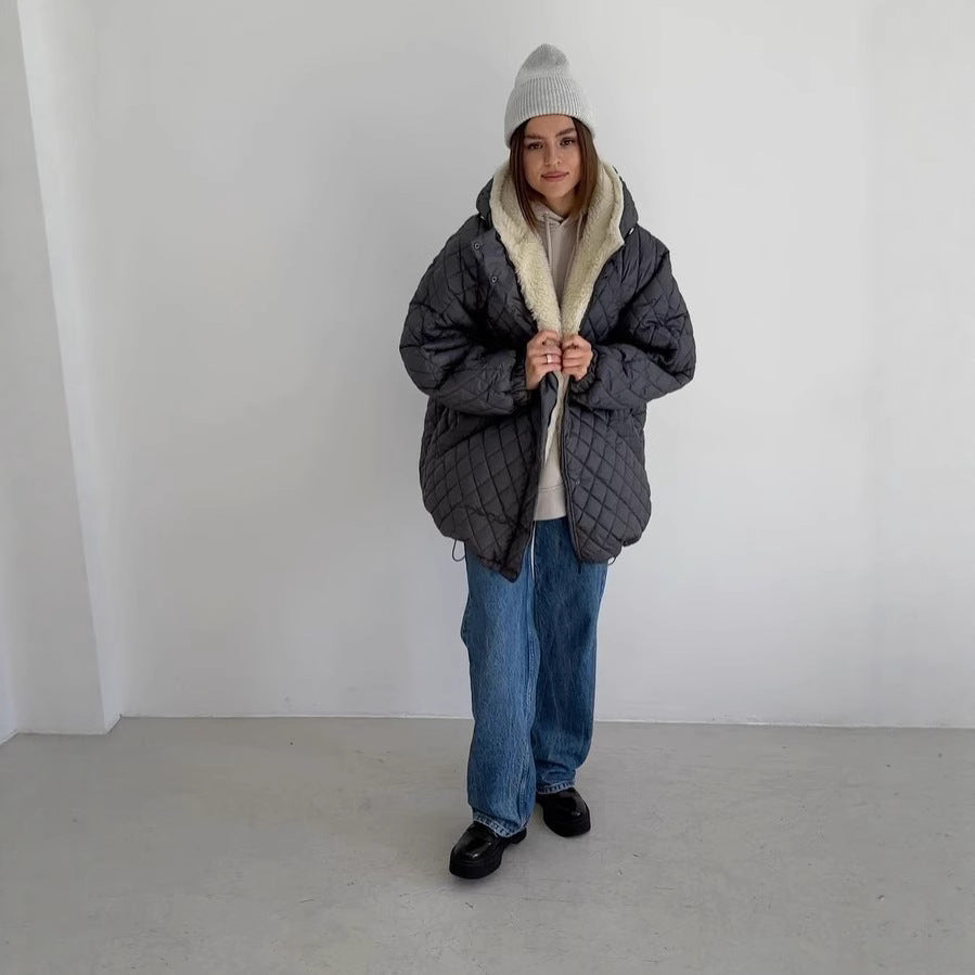 Oversized gewatteerde damesjas met teddyvoering en capuchon