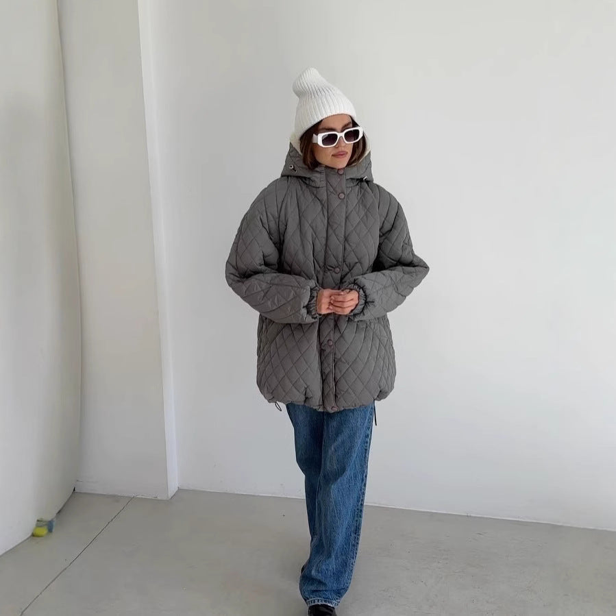 Oversized gewatteerde damesjas met teddyvoering en capuchon