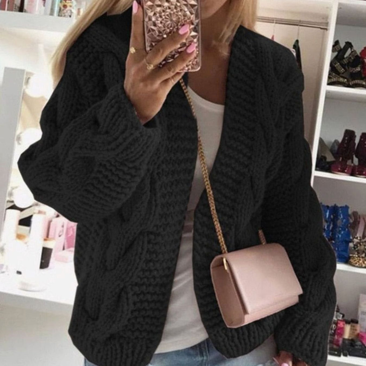Oversized openvallend grofgebreid damesvest met kabelpatroon
