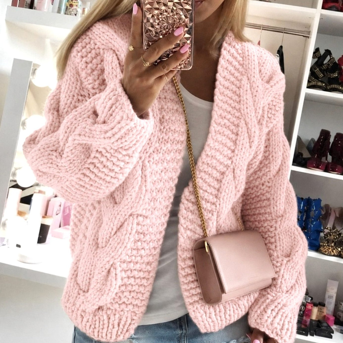 Oversized openvallend grofgebreid damesvest met kabelpatroon