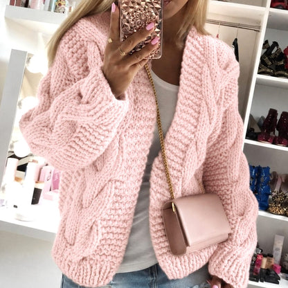 Oversized openvallend grofgebreid damesvest met kabelpatroon