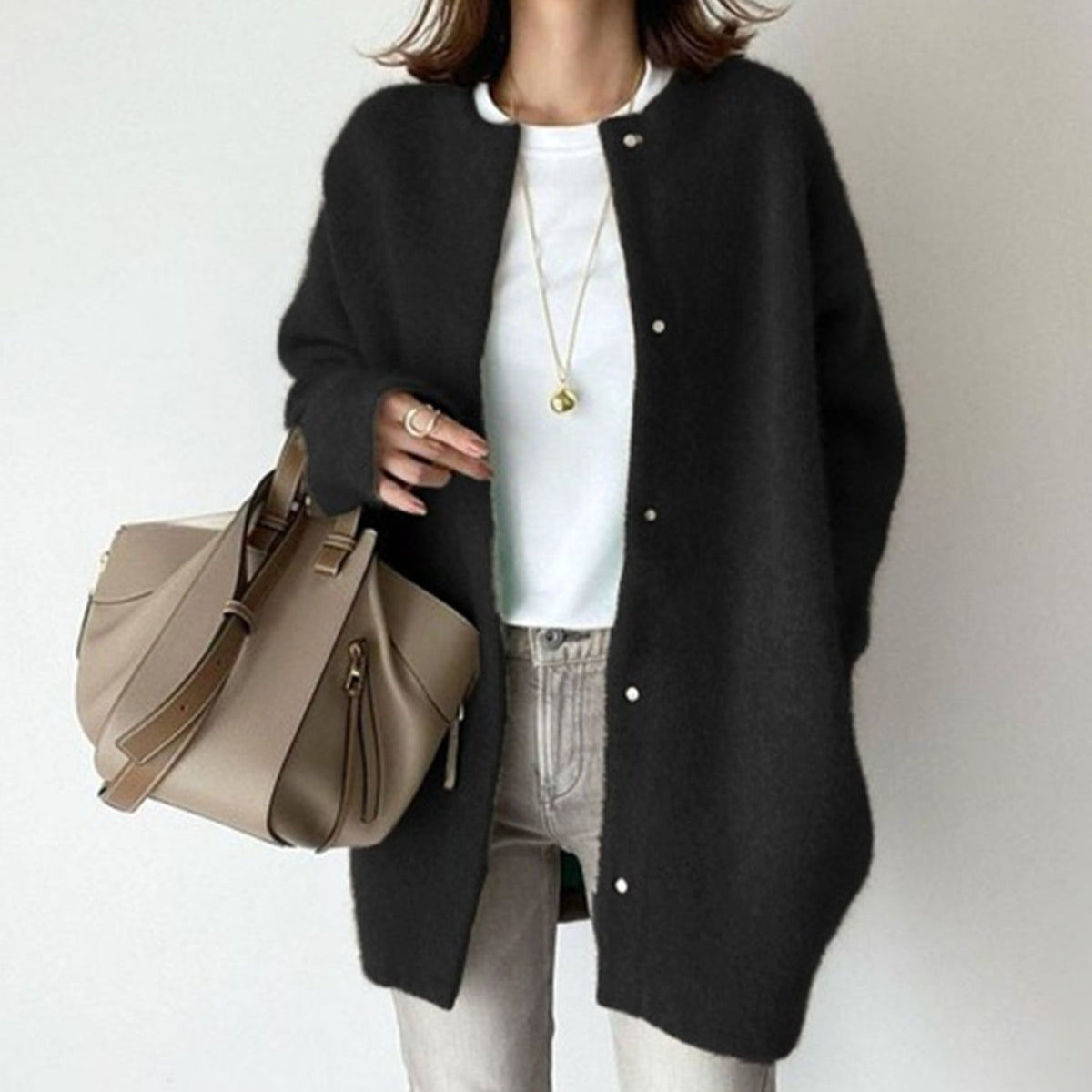 Oversized pluizig gebreid wintervest voor dames met knoopsluiting