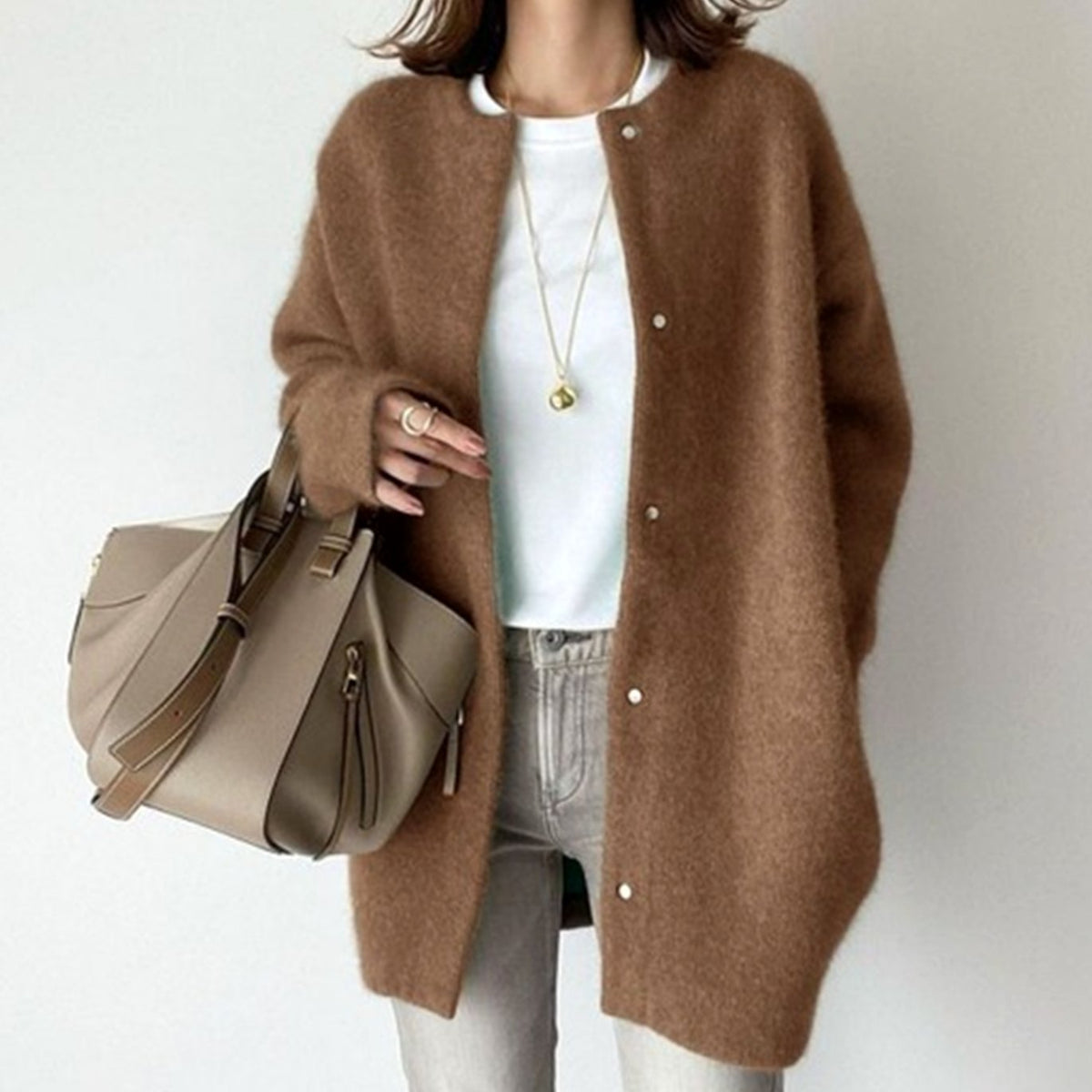 Oversized pluizig gebreid wintervest voor dames met knoopsluiting