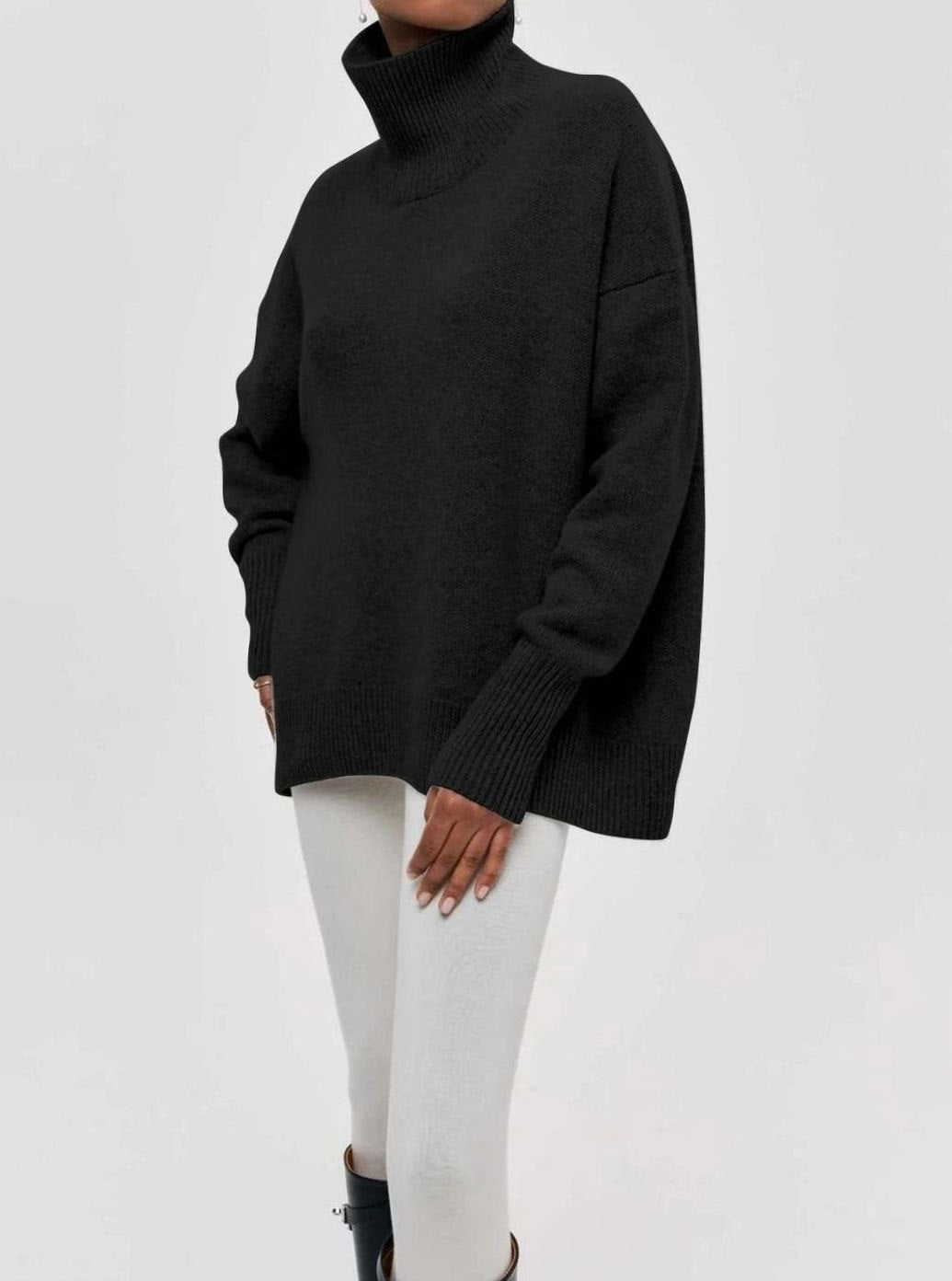 Oversized ribgebreide dameskoltrui met elleboogsplit