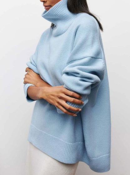 Oversized ribgebreide dameskoltrui met elleboogsplit