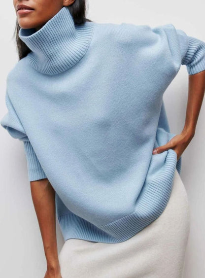 Oversized ribgebreide dameskoltrui met elleboogsplit
