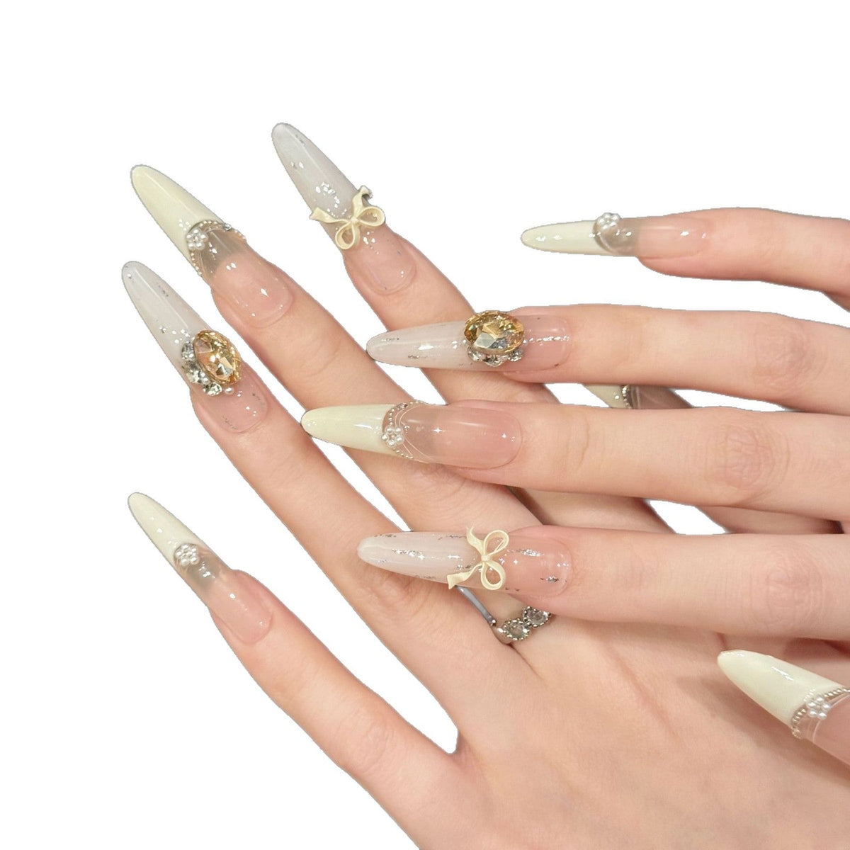 Premium decoratieve press-on nagelset met unieke edelsteen- en strikaccenten