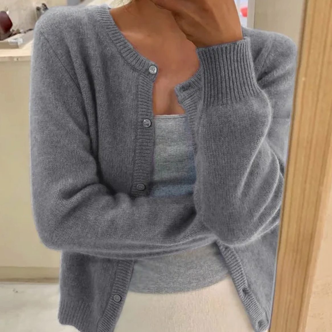 Relaxed-fit damesvest met knopen en lange mouwen