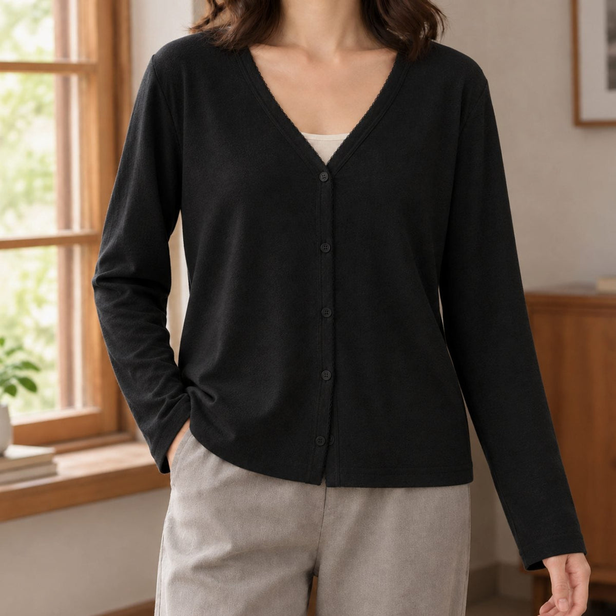 Relaxed-fit damesvest met V-hals en knoopsluiting