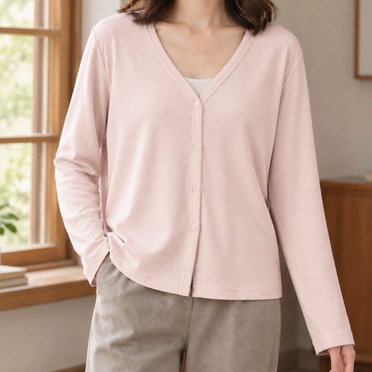 Relaxed-fit damesvest met V-hals en knoopsluiting