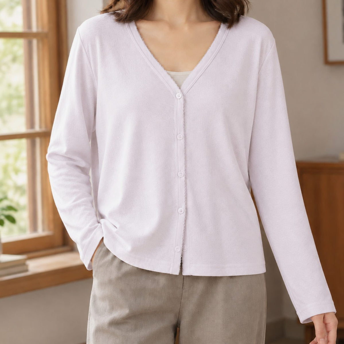 Relaxed-fit damesvest met V-hals en knoopsluiting