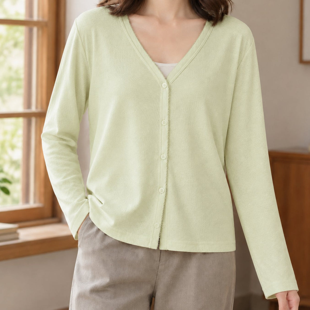 Relaxed-fit damesvest met V-hals en knoopsluiting