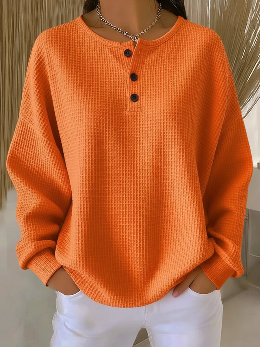 Relaxte wafelgebreide henley trui voor dames