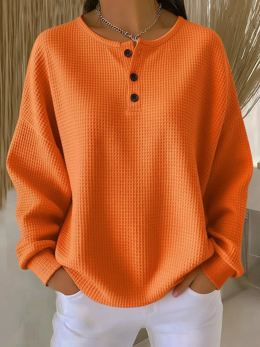 Relaxte wafelgebreide henley trui voor dames