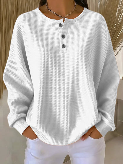 Relaxte wafelgebreide henley trui voor dames