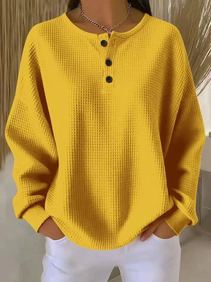 Relaxte wafelgebreide henley trui voor dames