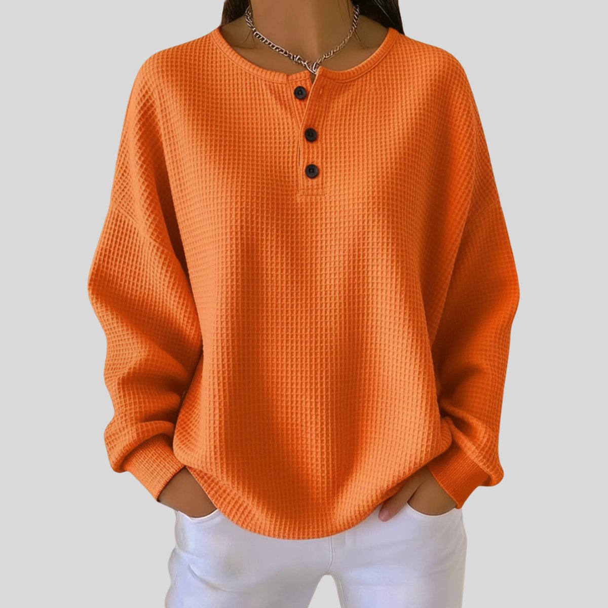 Relaxte wafelgebreide henley trui voor dames