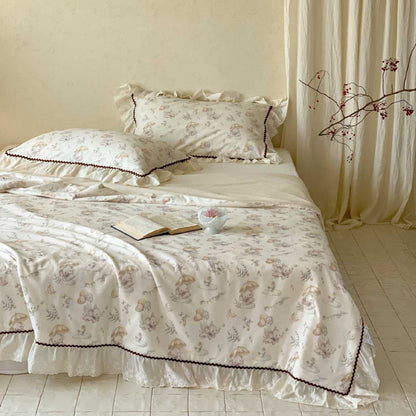 Romantische beddengoedset van katoensatijn met aquarel bloemenprint, ruches en sierrand