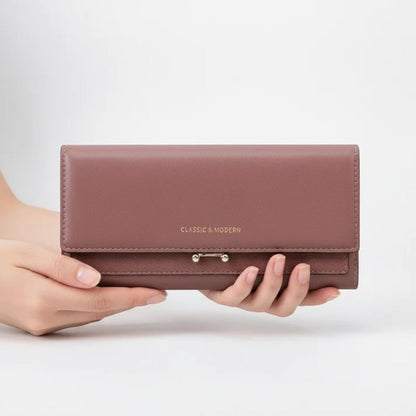 Ruime damesportemonnee met telefoonvak en elegante details