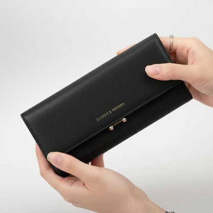 Ruime damesportemonnee met telefoonvak en elegante details