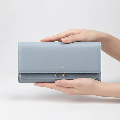 Ruime damesportemonnee met telefoonvak en elegante details