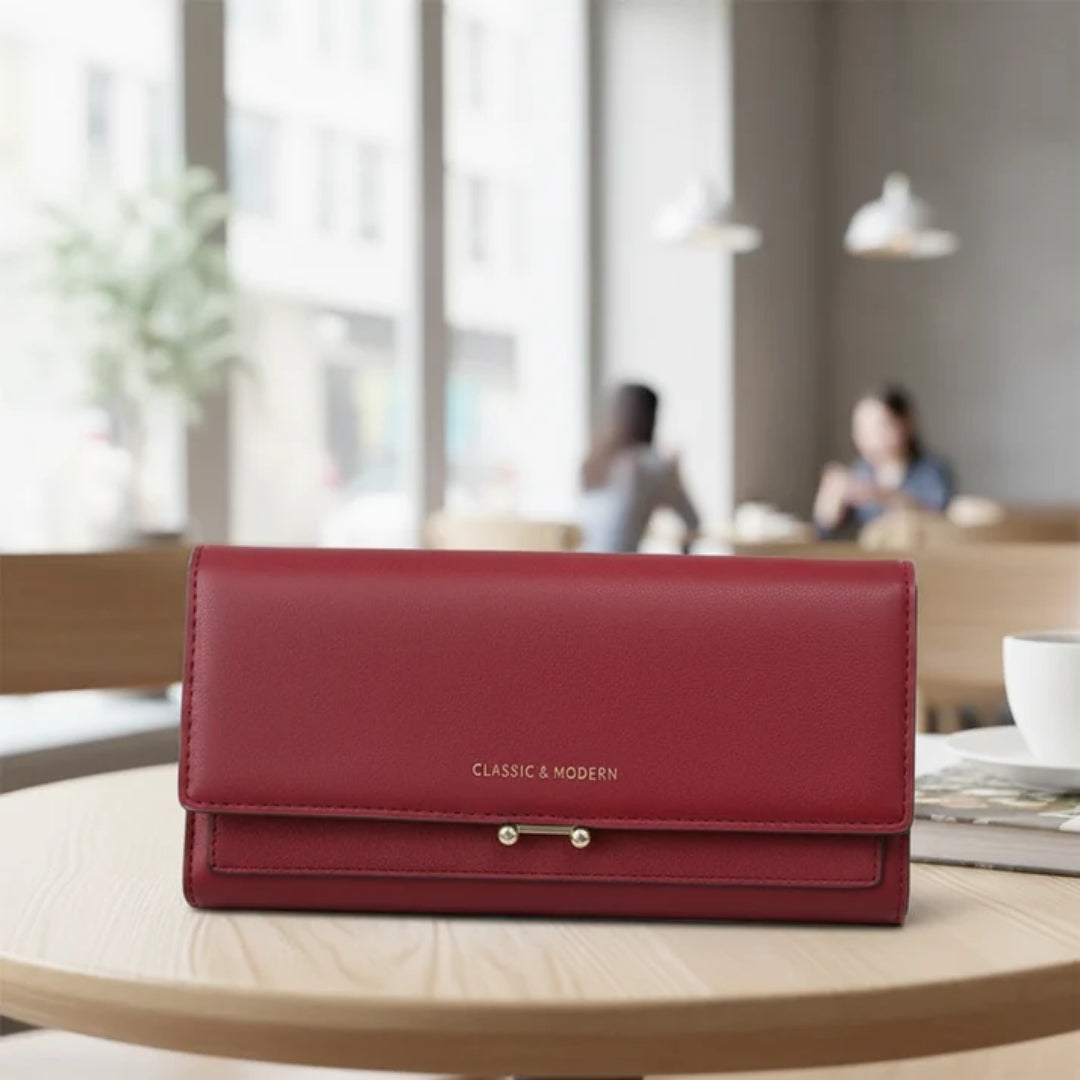 Ruime damesportemonnee met telefoonvak en elegante details