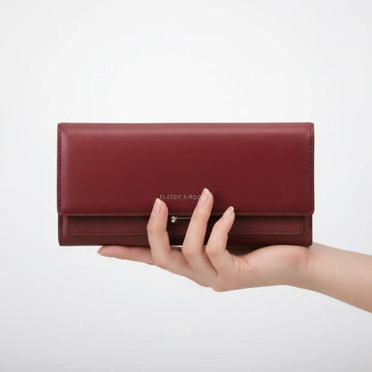 Ruime damesportemonnee met telefoonvak en elegante details