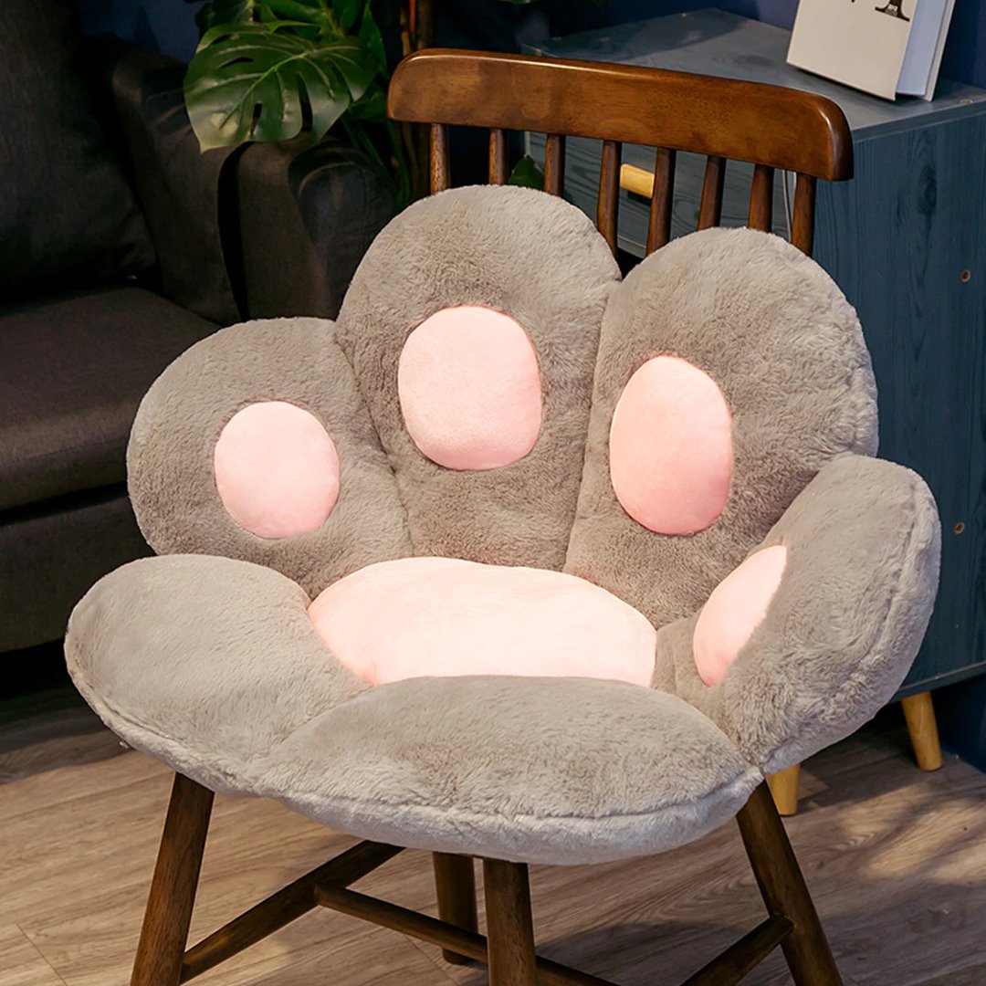 Schattig kawaii zitkussen in pootvorm in pastelkleuren