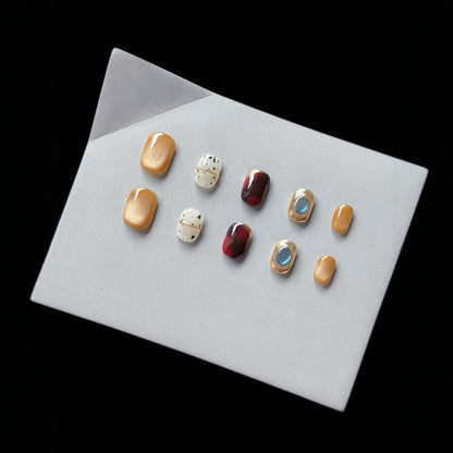 Stijlvolle press-on nagelset met glamoureuze designs