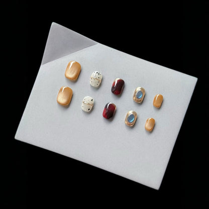 Stijlvolle press-on nagelset met glamoureuze designs