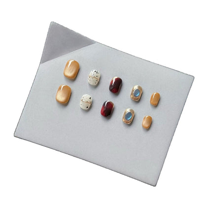 Stijlvolle press-on nagelset met glamoureuze designs