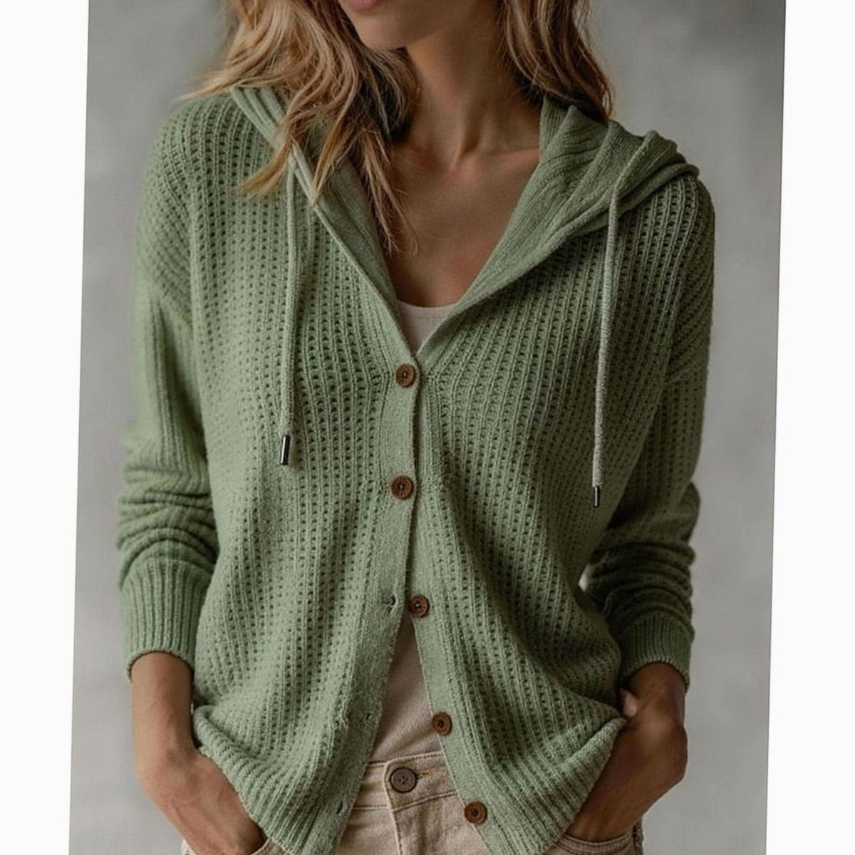 Wafelgebreid vest met capuchon en knopen voor dames